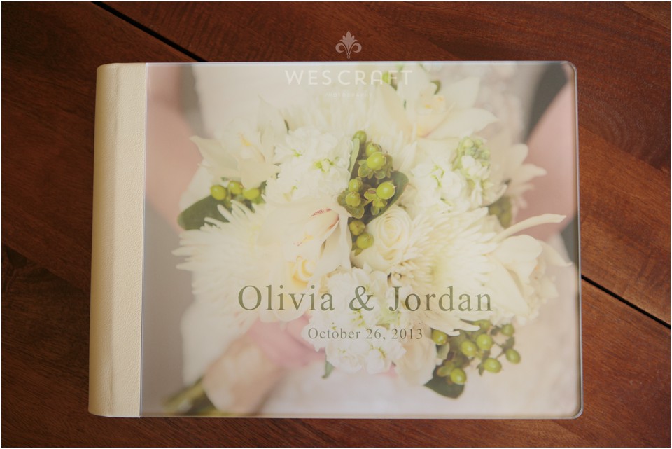 Olivia chose to have a detail of her bouquet as the cover photo.  The photo is sealed beneath an acrylic and is bound with an Ivory Italian Leather.