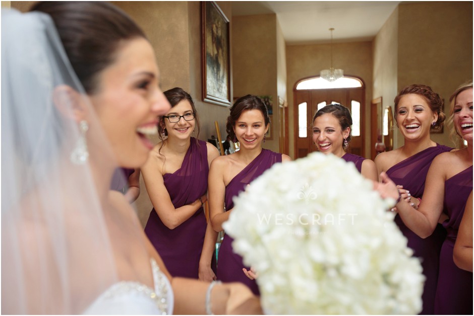 Kristiana's bridesmaids glow as K exits her changing room to reveal the dress.