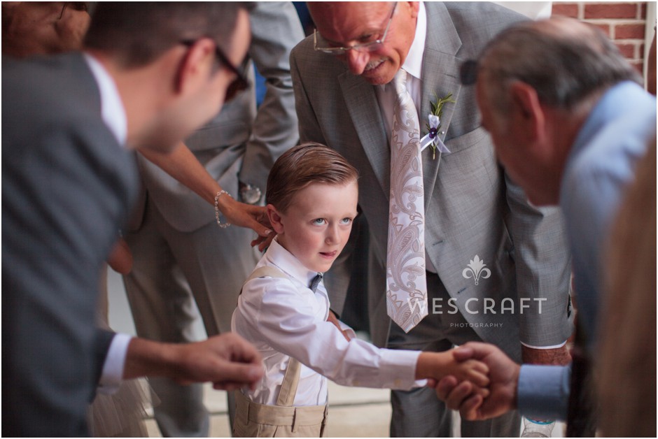 This young man attempts to impress with his handshake. Photo by Aneta Wisniewska.