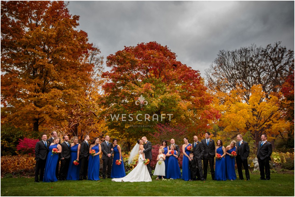 Deanna chose blue for her bridesmaids and it really stood out off of the fall colors behind them.