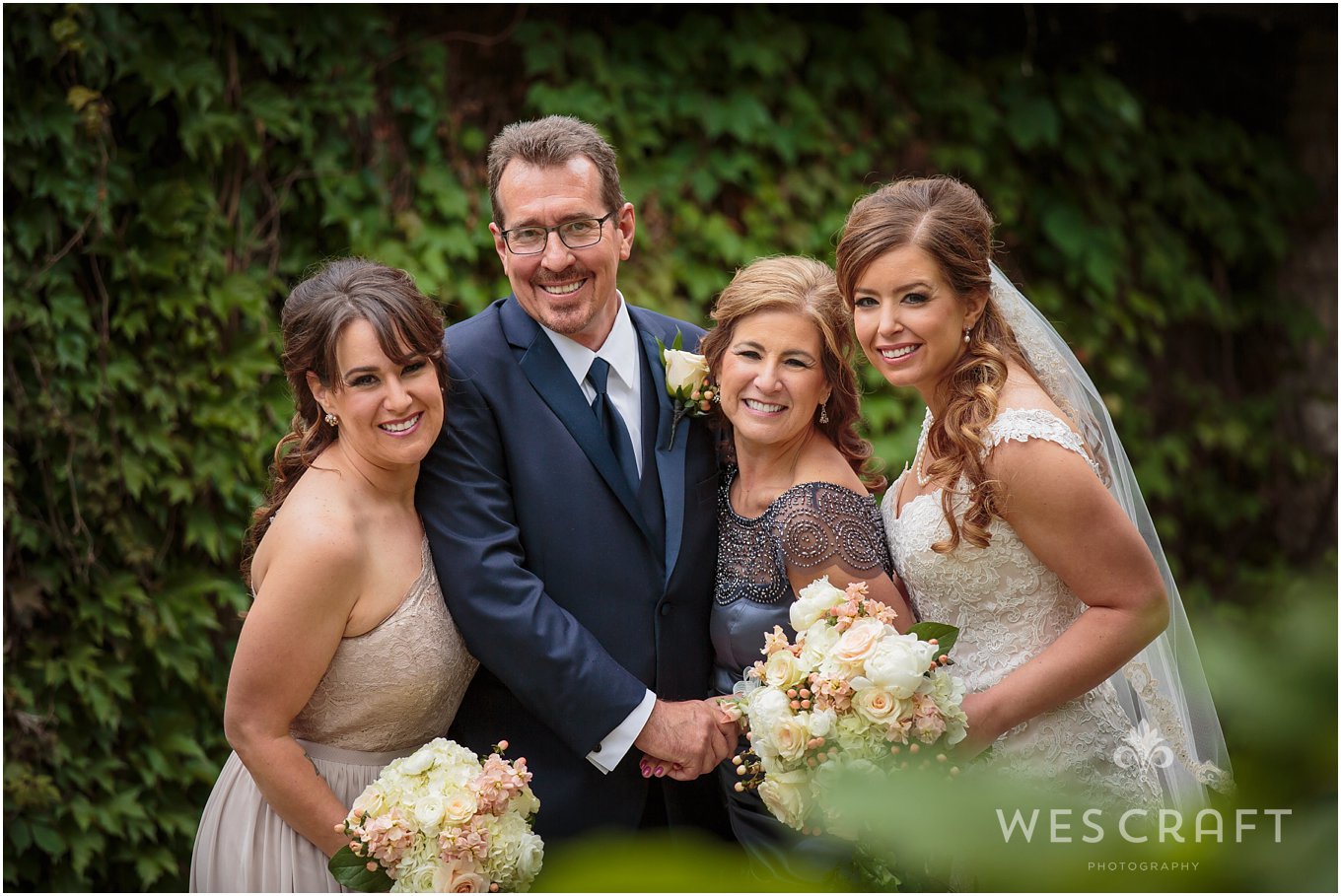 We stepped outside with Jennifer's family for some pre-ceremony portraits utilizing lush ivy covered walls.