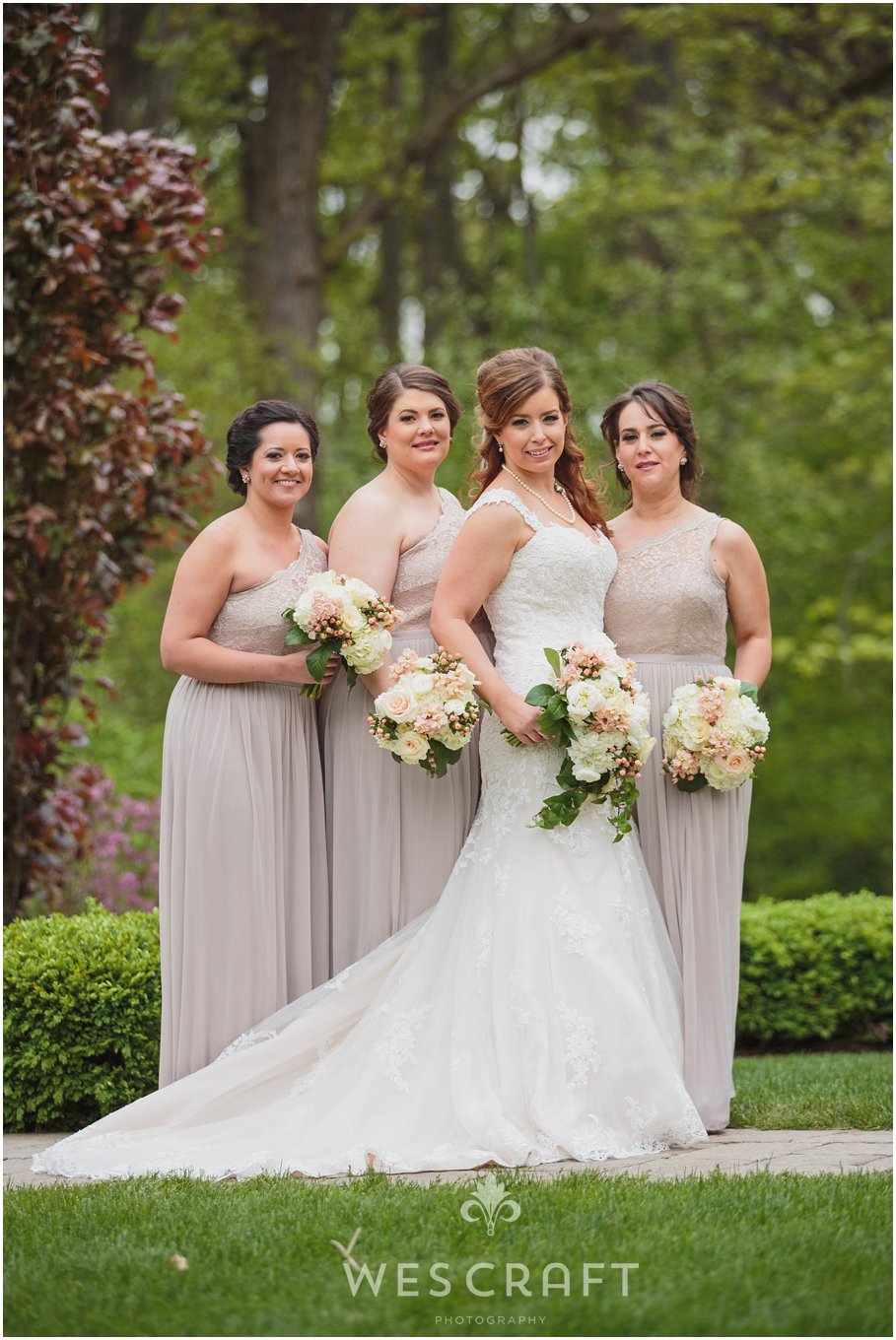 The bridesmaids wore soft flowing full length dresses in a nude neutral color. It played into the softness and natural theme at the estate.